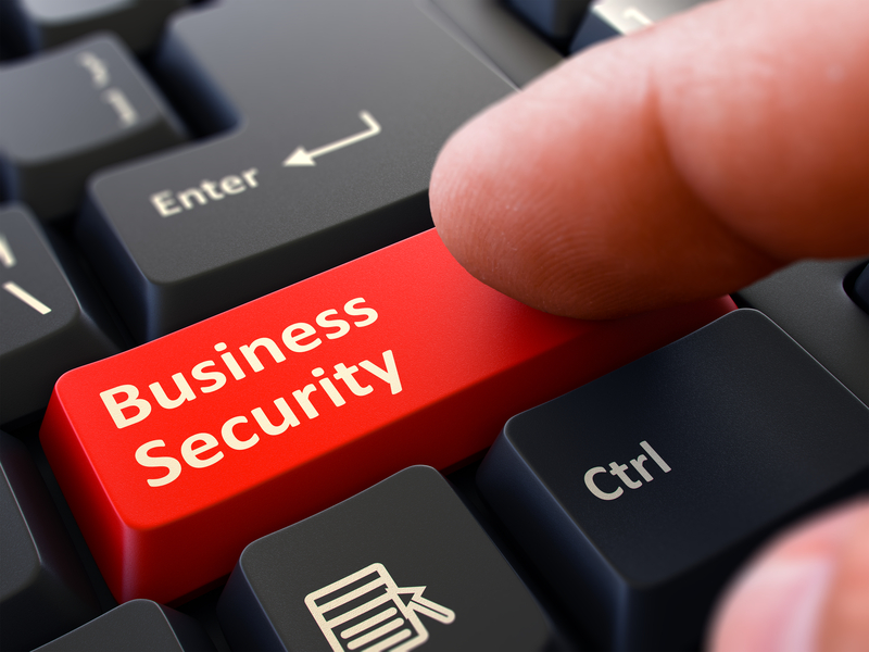 Finger Presses Red Keyboard Button Business Security. Business Security Risk Assessments and Consultation in Tampa, Florida